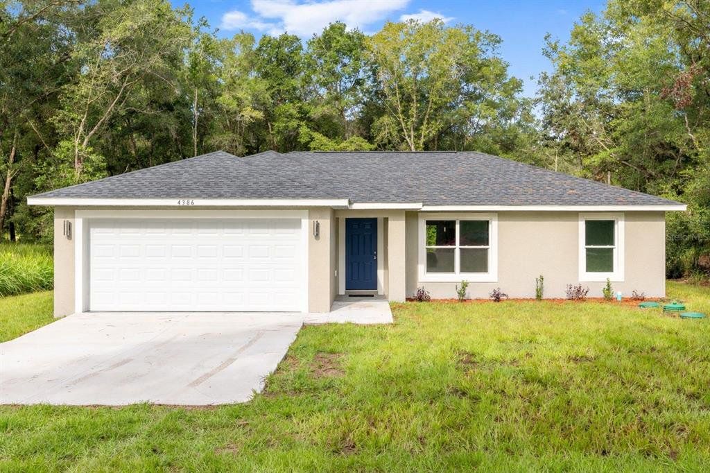 Front exterior of a new home in , Dunnellon, FL, highlighting curb appeal (Image 1). Front exterior of a new home in , Dunnellon, FL, highlighting curb appeal (Image 1).