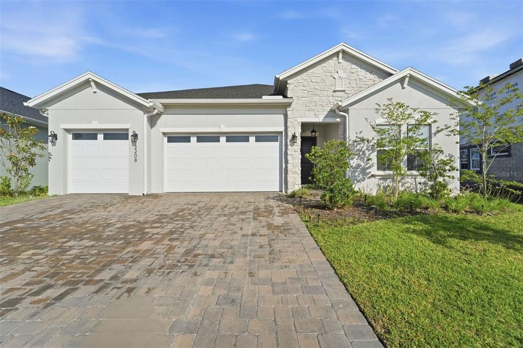 Front exterior of a new home in , Daytona Beach, FL, highlighting curb appeal (Image 1). Front exterior of a new home in , Daytona Beach, FL, highlighting curb appeal (Image 1).