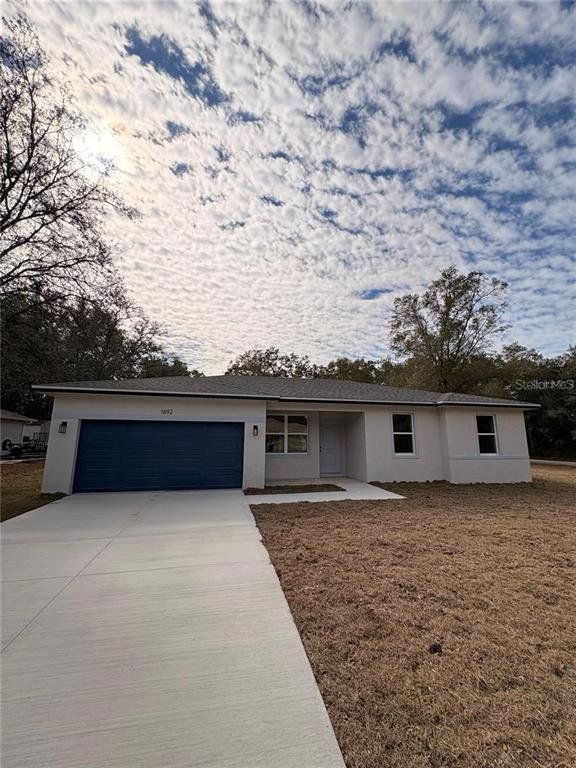 Front exterior of a new home in , Dunnellon, FL, highlighting curb appeal (Image 1). Front exterior of a new home in , Dunnellon, FL, highlighting curb appeal (Image 1).