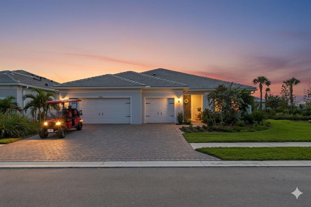 Front exterior of a new home in , Englewood, FL, highlighting curb appeal (Image 1). Front exterior of a new home in , Englewood, FL, highlighting curb appeal (Image 1).