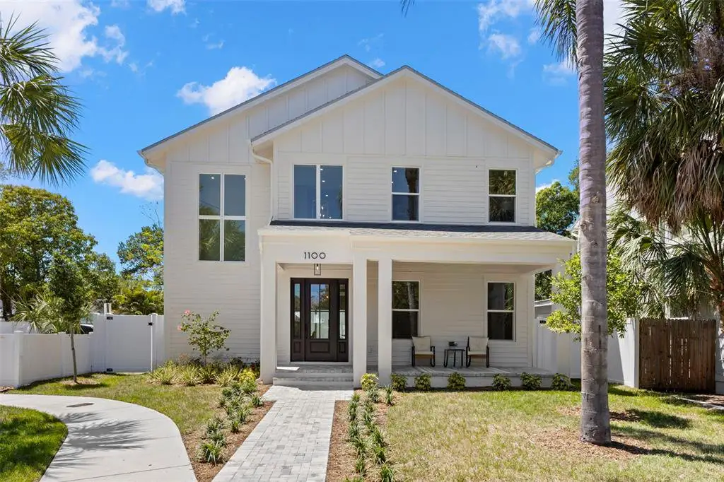 Front exterior of a new home in , St. Petersburg, FL, highlighting curb appeal (Image 1). Front exterior of a new home in , St. Petersburg, FL, highlighting curb appeal (Image 1).
