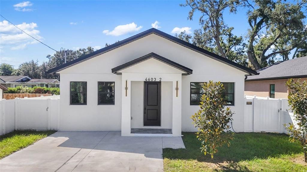 Front exterior of a new home in , Tampa, FL, highlighting curb appeal (Image 1). Front exterior of a new home in , Tampa, FL, highlighting curb appeal (Image 1).