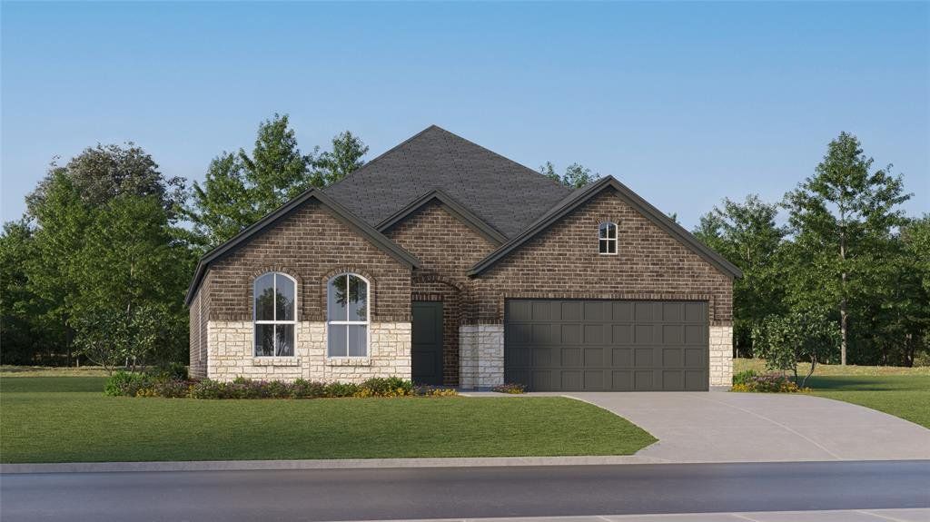 View of front of home with stone siding, a front lawn, brick siding, driveway, and an attached garage View of front of home with stone siding, a front lawn, brick siding, driveway, and an attached garage