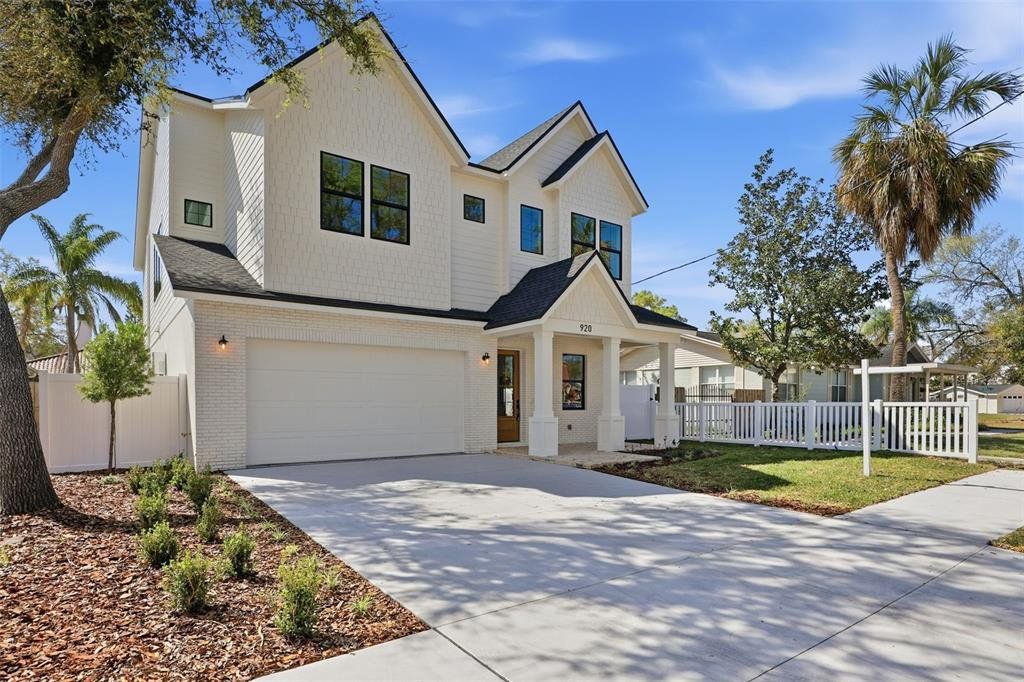 Front exterior of a new home in , Tampa, FL, highlighting curb appeal (Image 1). Front exterior of a new home in , Tampa, FL, highlighting curb appeal (Image 1).