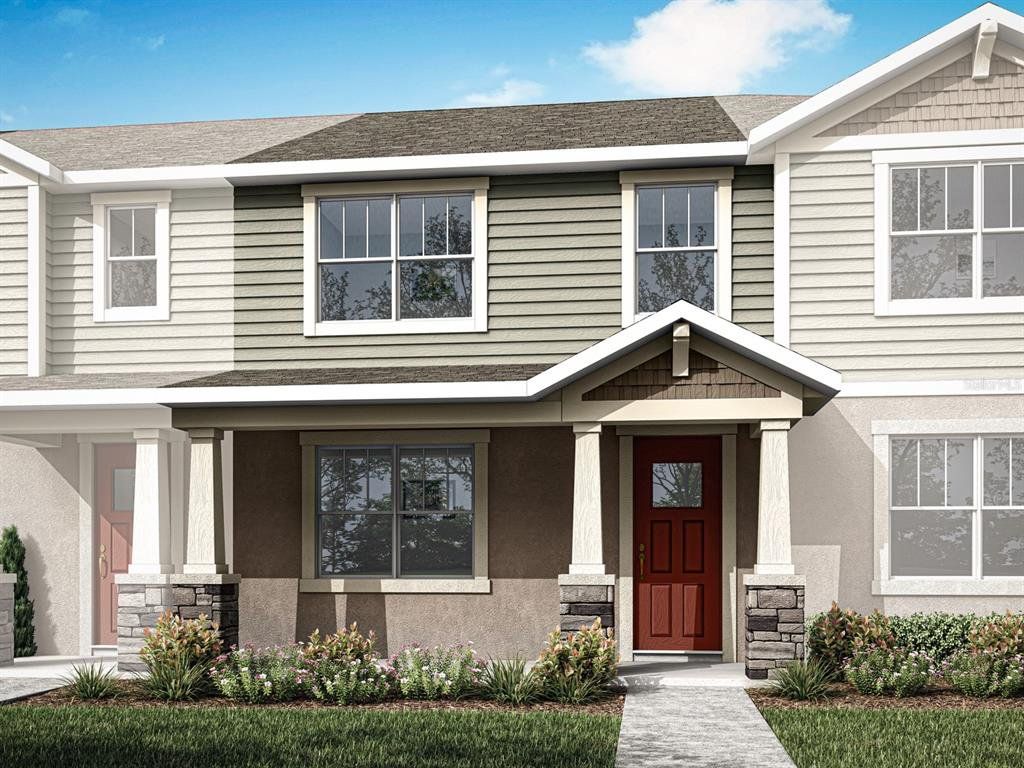 Front exterior of a new home in Gardenia Reserve, Apopka, FL, highlighting curb appeal (Image 1). Front exterior of a new home in Gardenia Reserve, Apopka, FL, highlighting curb appeal (Image 1).