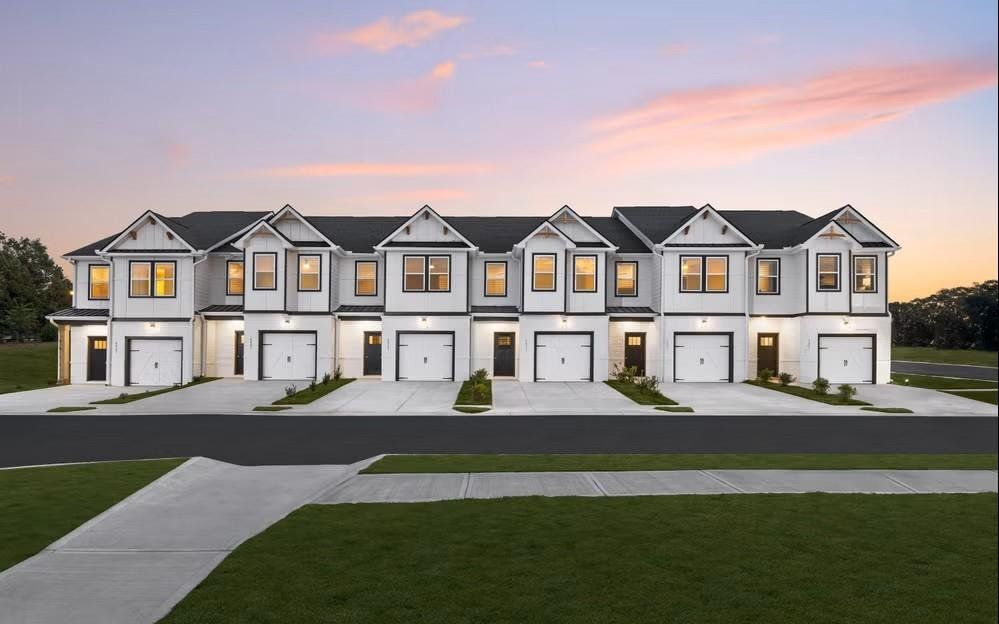 Front exterior of a new home in Carolina, Palmetto, GA, highlighting curb appeal (Image 1). Front exterior of a new home in Carolina, Palmetto, GA, highlighting curb appeal (Image 1).