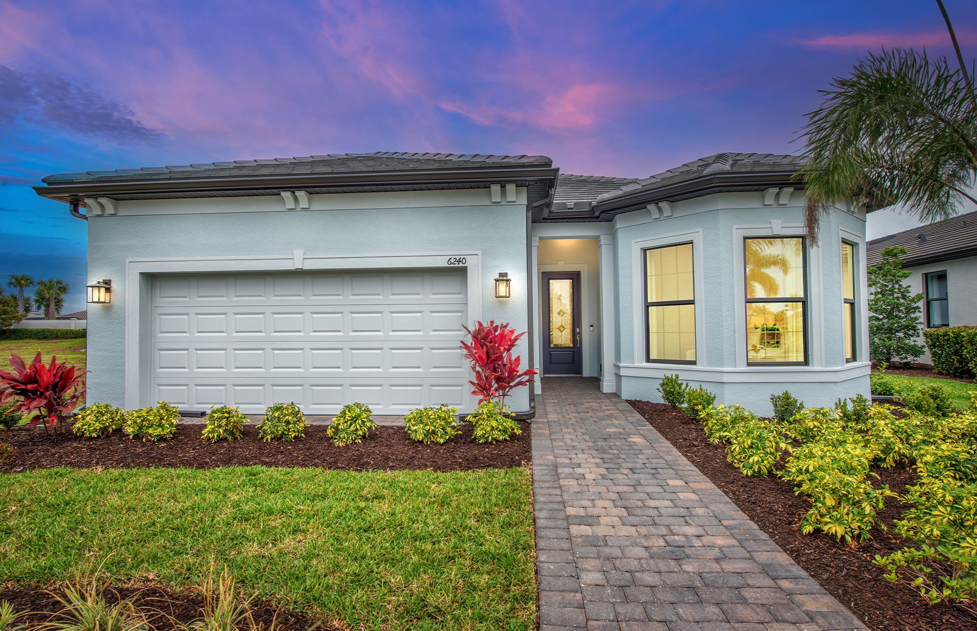 Exterior details and patio area of a home in Talon Preserve on Palmer Ranch, Nokomis (Image 1).