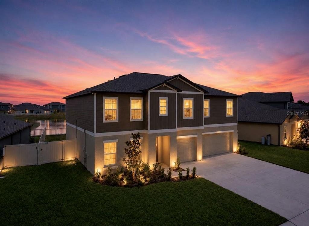 Front exterior of a new home in , Parrish, FL, highlighting curb appeal (Image 1). Front exterior of a new home in , Parrish, FL, highlighting curb appeal (Image 1).