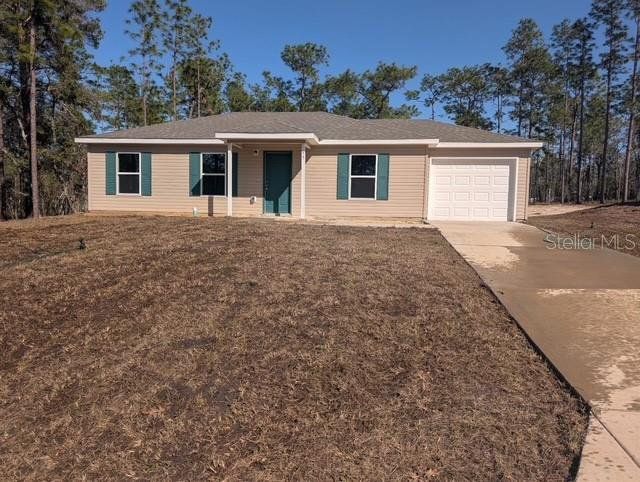 Front exterior of a new home in , Dunnellon, FL, highlighting curb appeal (Image 1). Front exterior of a new home in , Dunnellon, FL, highlighting curb appeal (Image 1).