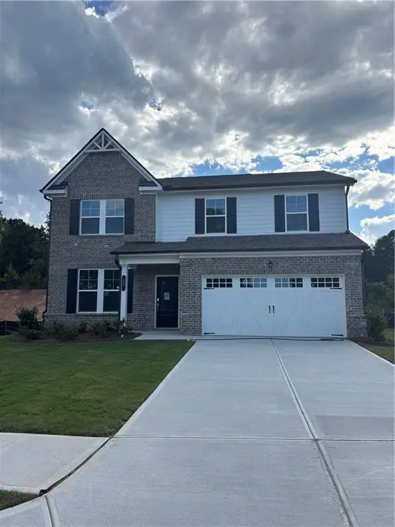 Front exterior of a new home in , Winder, GA, highlighting curb appeal (Image 1). Front exterior of a new home in , Winder, GA, highlighting curb appeal (Image 1).