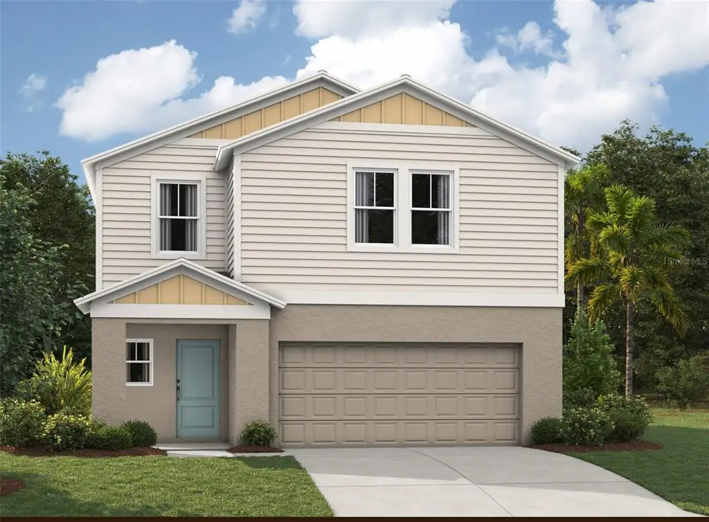 Front exterior of a new home in Crosswinds, Haines City, FL, highlighting curb appeal (Image 1). Front exterior of a new home in Crosswinds, Haines City, FL, highlighting curb appeal (Image 1).