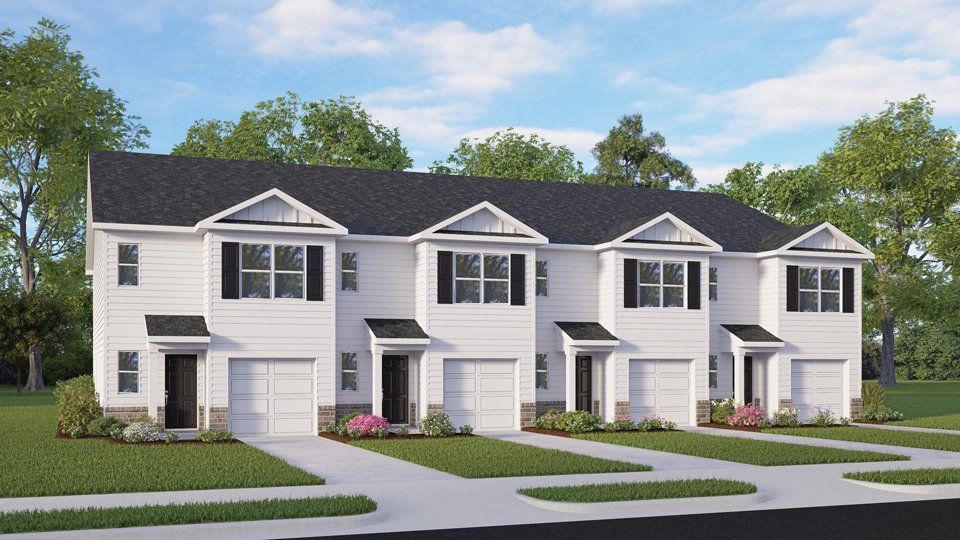 Front exterior of a new home in The Townes at Laurel Oaks, Sanford, NC, highlighting curb appeal (Image 1). Front exterior of a new home in The Townes at Laurel Oaks, Sanford, NC, highlighting curb appeal (Image 1).