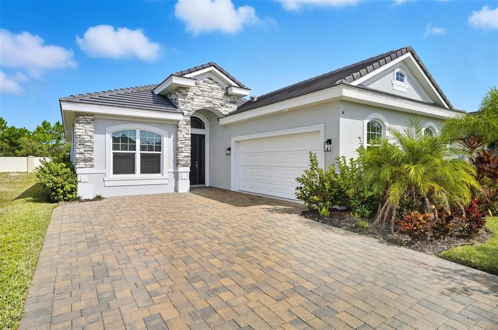 Exterior details and patio area of a home in Marina Del Palma, Palm Coast (Image 1). Exterior details and patio area of a home in Marina Del Palma, Palm Coast (Image 1).