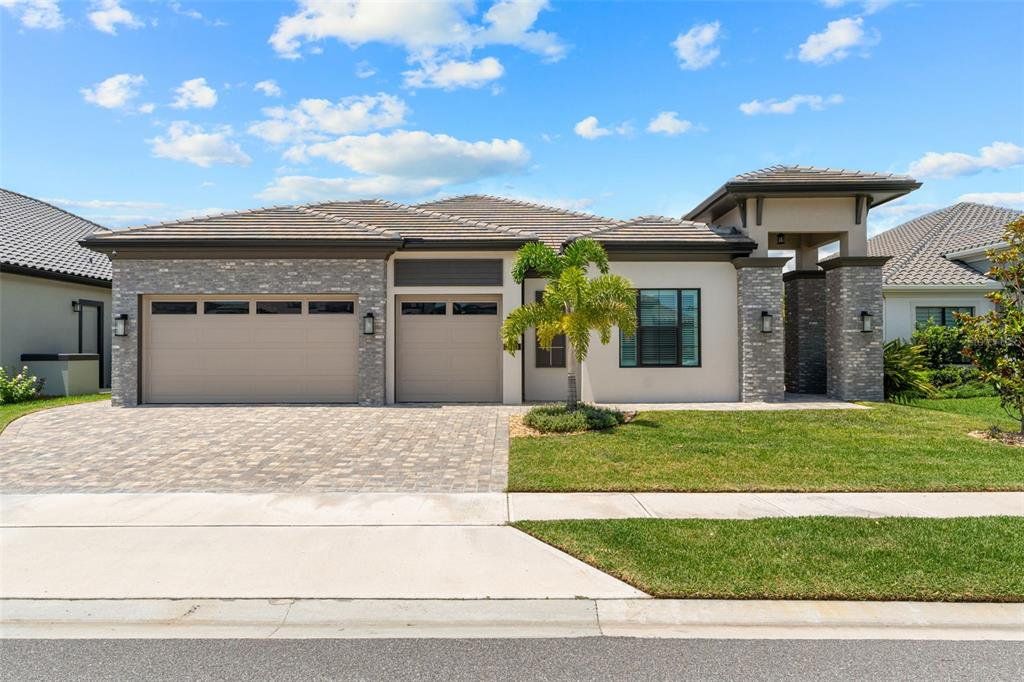 Front exterior of a new home in , Melbourne, FL, highlighting curb appeal (Image 1). Front exterior of a new home in , Melbourne, FL, highlighting curb appeal (Image 1).