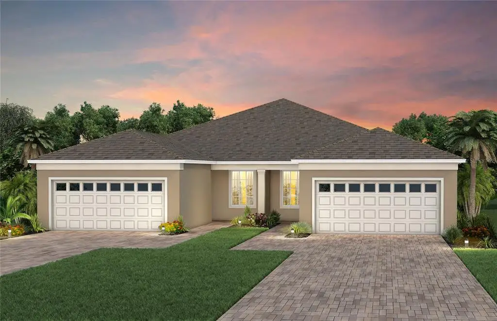 Front exterior of a new home in Del Webb Oasis, Winter Garden, FL, highlighting curb appeal (Image 1). Front exterior of a new home in Del Webb Oasis, Winter Garden, FL, highlighting curb appeal (Image 1).