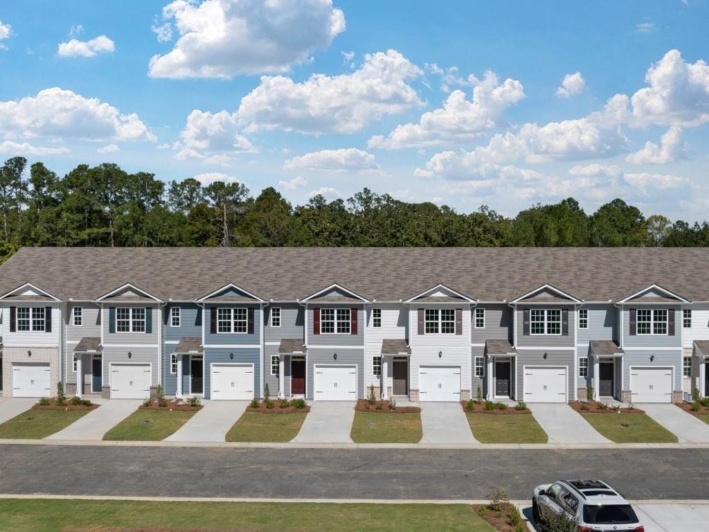 Front exterior of a new home in Old Summerville Village, Rome, GA, highlighting curb appeal (Image 1).
