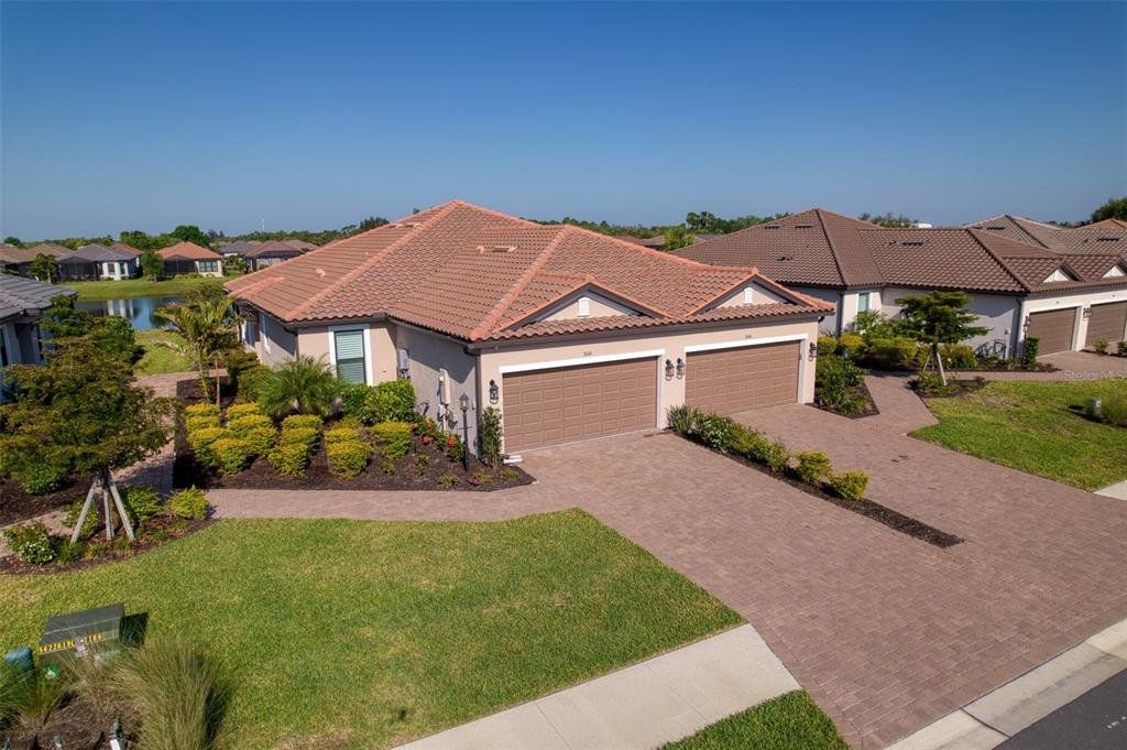 Front exterior of a new home in , Bradenton, FL, highlighting curb appeal (Image 1). Front exterior of a new home in , Bradenton, FL, highlighting curb appeal (Image 1).