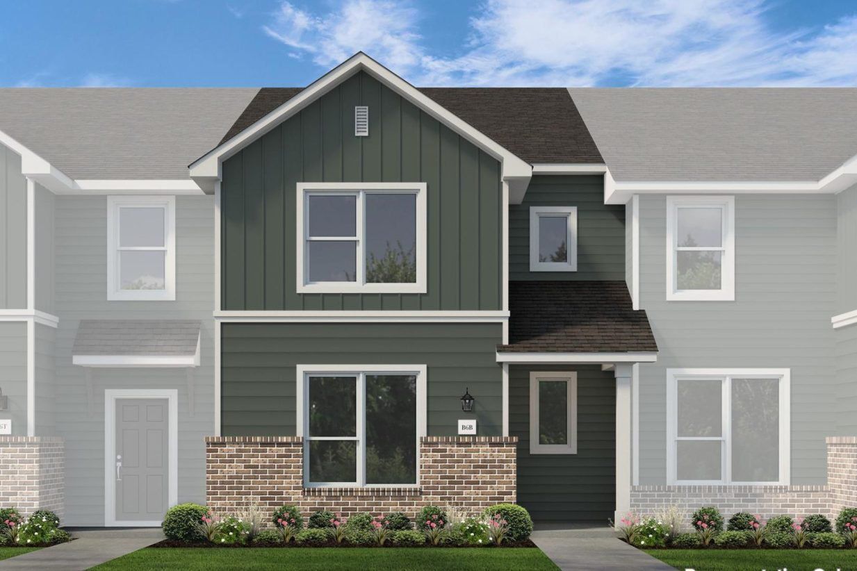 Front exterior of a new home in Seven Oaks Townhomes, Tomball, TX, highlighting curb appeal (Image 1). Front exterior of a new home in Seven Oaks Townhomes, Tomball, TX, highlighting curb appeal (Image 1).