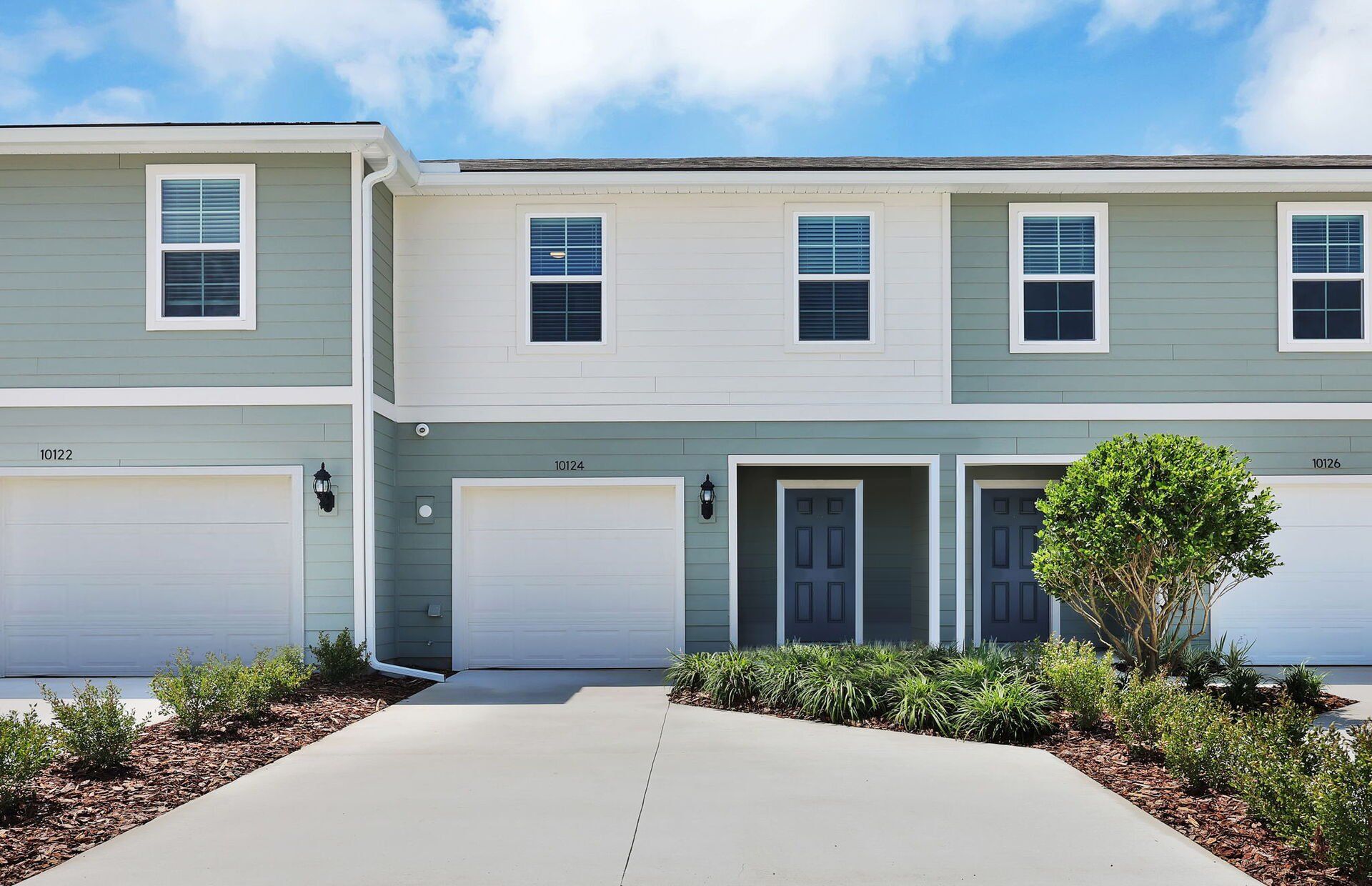 Front exterior of a new home in Normandy Pines, Jacksonville, FL, highlighting curb appeal (Image 1). Front exterior of a new home in Normandy Pines, Jacksonville, FL, highlighting curb appeal (Image 1).