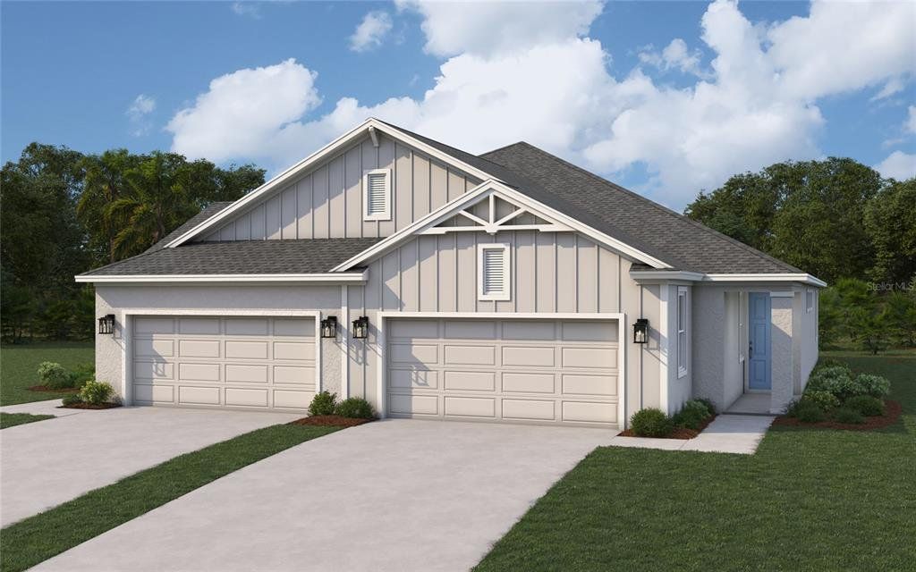 Front exterior of a new home in Fairway Pointe - 55+ Villa Community, Sun City Center, FL, highlighting curb appeal (Image 1).