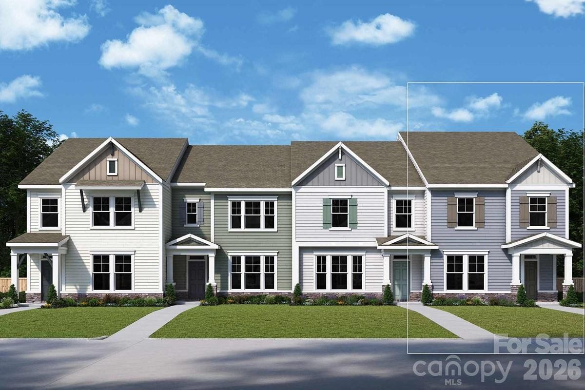Front exterior of a new home in North Creek Village, Huntersville, NC, highlighting curb appeal (Image 1). Front exterior of a new home in North Creek Village, Huntersville, NC, highlighting curb appeal (Image 1).