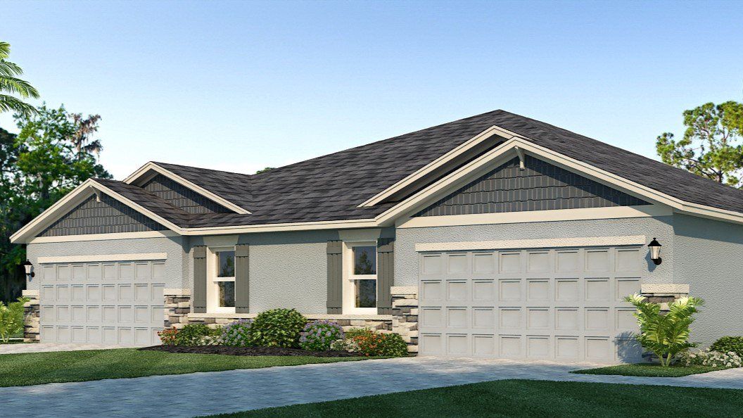 Front exterior of a new home in Legacy Preserve, Parrish, FL, highlighting curb appeal (Image 1). Front exterior of a new home in Legacy Preserve, Parrish, FL, highlighting curb appeal (Image 1).