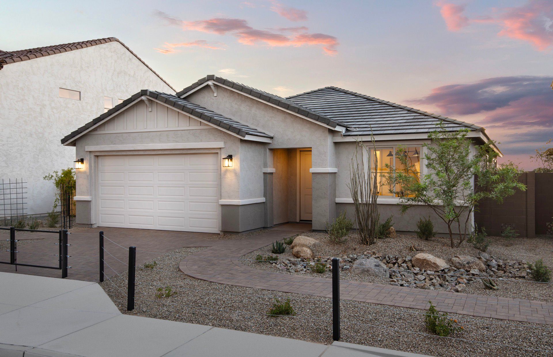 Front exterior of a new home in Soleo, San Tan Valley, AZ, highlighting curb appeal (Image 1). Front exterior of a new home in Soleo, San Tan Valley, AZ, highlighting curb appeal (Image 1).