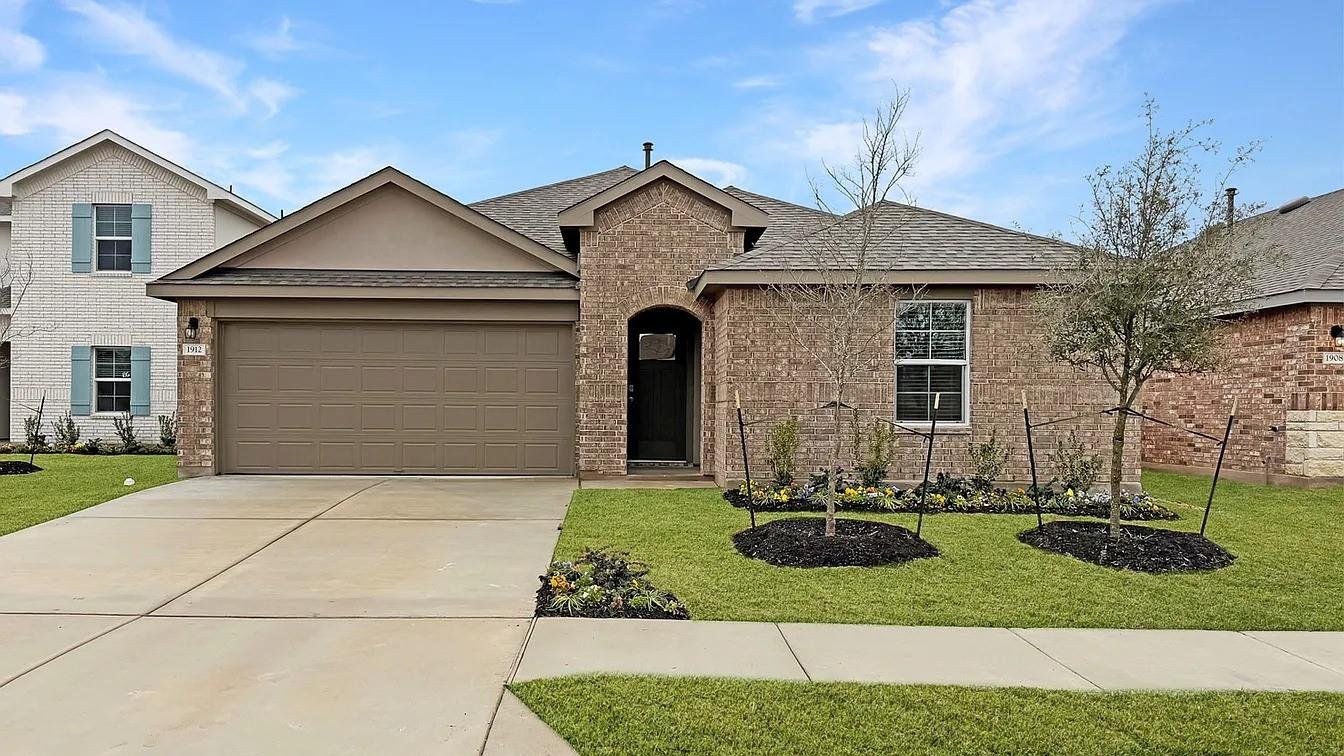 Front exterior of a new home in Bar W Ranch, Leander, TX, highlighting curb appeal (Image 1). Front exterior of a new home in Bar W Ranch, Leander, TX, highlighting curb appeal (Image 1).