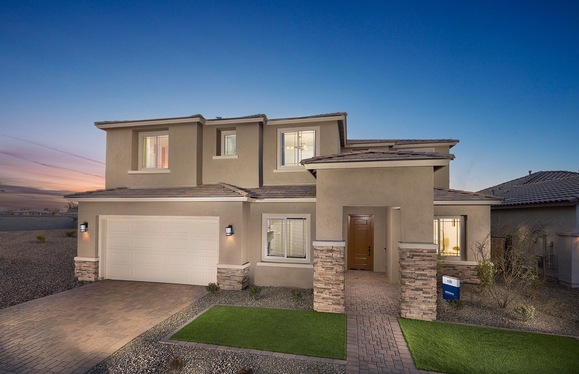 Front exterior of a new home in Legado West, Queen Creek, AZ, highlighting curb appeal (Image 1).