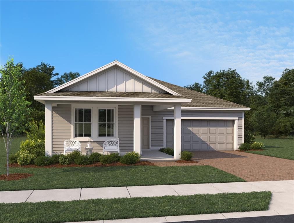 Front exterior of a new home in Ardisia Park, New Smyrna Beach, FL, highlighting curb appeal (Image 1). Front exterior of a new home in Ardisia Park, New Smyrna Beach, FL, highlighting curb appeal (Image 1).