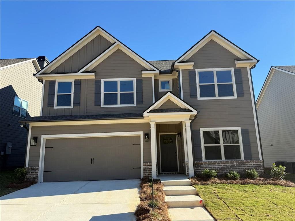 Front exterior of a new home in Ridge Pointe, Athens, GA, highlighting curb appeal (Image 1).