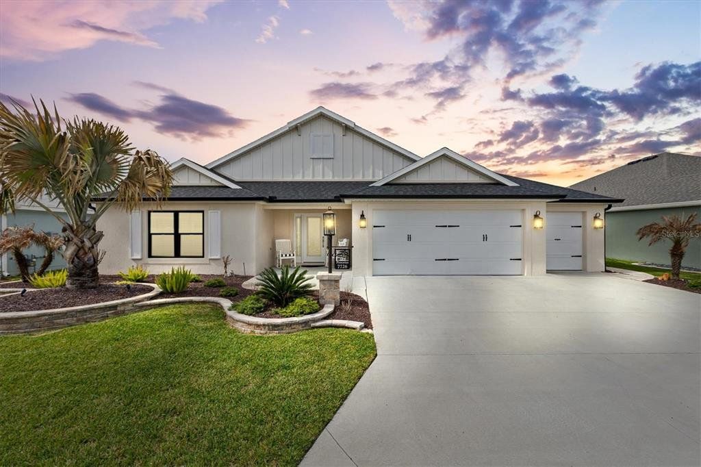 Front exterior of a new home in , The Villages, FL, highlighting curb appeal (Image 1). Front exterior of a new home in , The Villages, FL, highlighting curb appeal (Image 1).