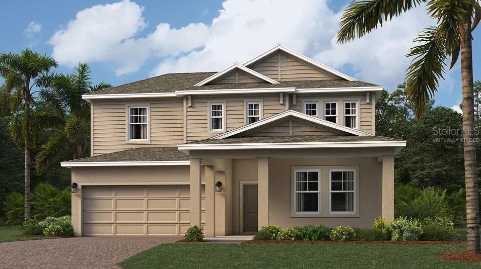 Front exterior of a new home in Waterstone, Groveland, FL, highlighting curb appeal (Image 1). Front exterior of a new home in Waterstone, Groveland, FL, highlighting curb appeal (Image 1).
