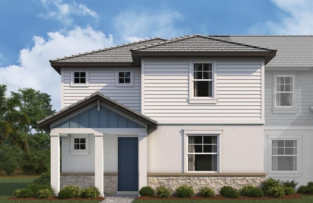 Front exterior of a new home in Palmera at Wellen Park, Venice, FL, highlighting curb appeal (Image 1). Front exterior of a new home in Palmera at Wellen Park, Venice, FL, highlighting curb appeal (Image 1).