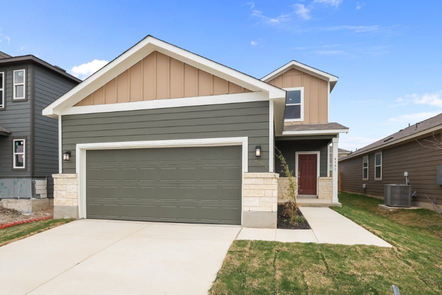 Front exterior of a new home in Applewhite Meadows, San Antonio, TX, highlighting curb appeal (Image 1). Front exterior of a new home in Applewhite Meadows, San Antonio, TX, highlighting curb appeal (Image 1).