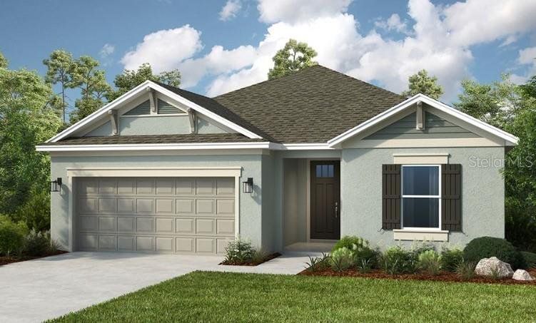 Front exterior of a new home in Firethorn, Parrish, FL, highlighting curb appeal (Image 1). Front exterior of a new home in Firethorn, Parrish, FL, highlighting curb appeal (Image 1).