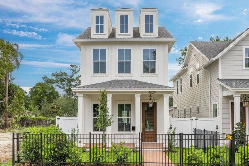 Front exterior of a new home in , St. Petersburg, FL, highlighting curb appeal (Image 1). Front exterior of a new home in , St. Petersburg, FL, highlighting curb appeal (Image 1).