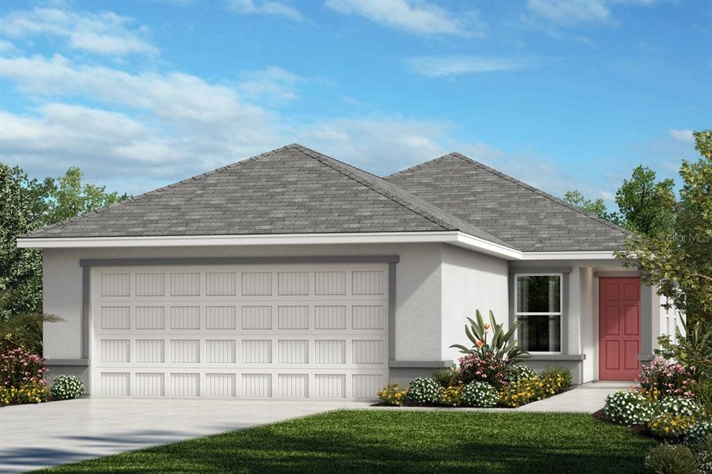 Front exterior of a new home in The Preserve at Legends Pointe I, Hudson, FL, highlighting curb appeal (Image 1). Front exterior of a new home in The Preserve at Legends Pointe I, Hudson, FL, highlighting curb appeal (Image 1).