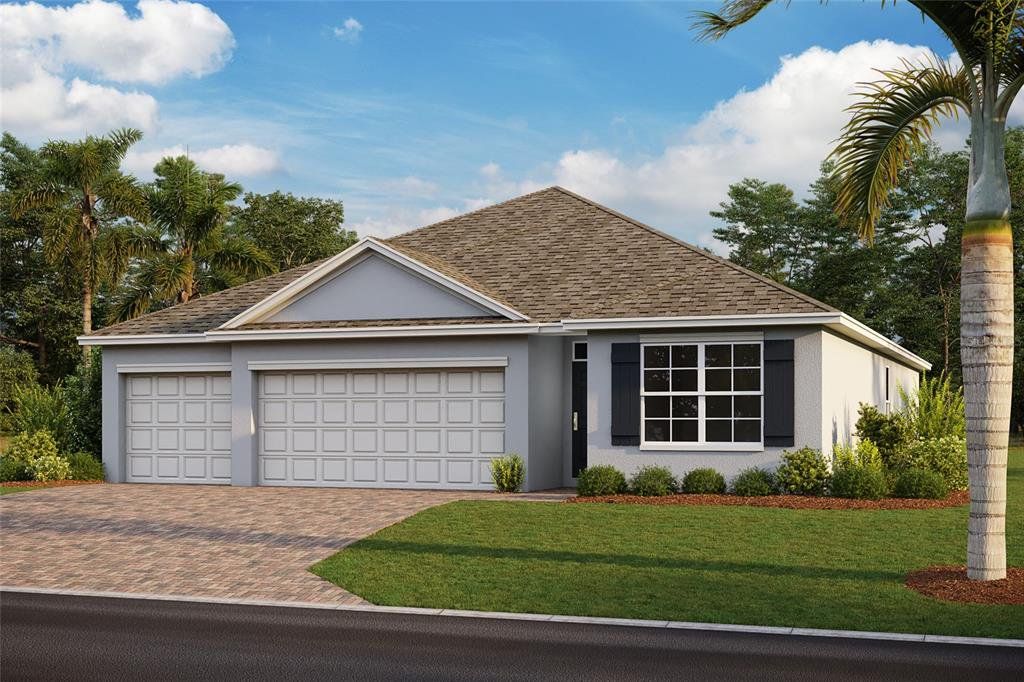 Front exterior of a new home in Deep Creek Tradition Series, Punta Gorda, FL, highlighting curb appeal (Image 1). Front exterior of a new home in Deep Creek Tradition Series, Punta Gorda, FL, highlighting curb appeal (Image 1).