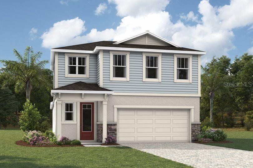 Front exterior of a new home in Chapel Crossings, Wesley Chapel, FL, highlighting curb appeal (Image 1). Front exterior of a new home in Chapel Crossings, Wesley Chapel, FL, highlighting curb appeal (Image 1).