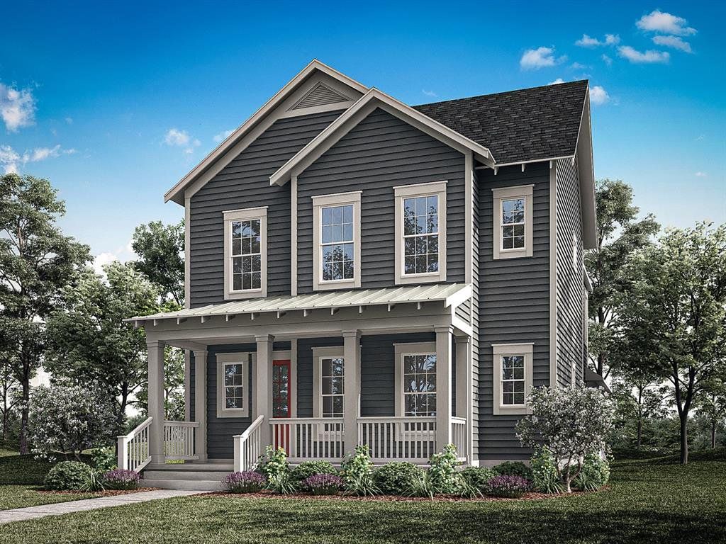 Front exterior of a new home in Celebration - Island Village, Celebration, FL, highlighting curb appeal (Image 1). Front exterior of a new home in Celebration - Island Village, Celebration, FL, highlighting curb appeal (Image 1).