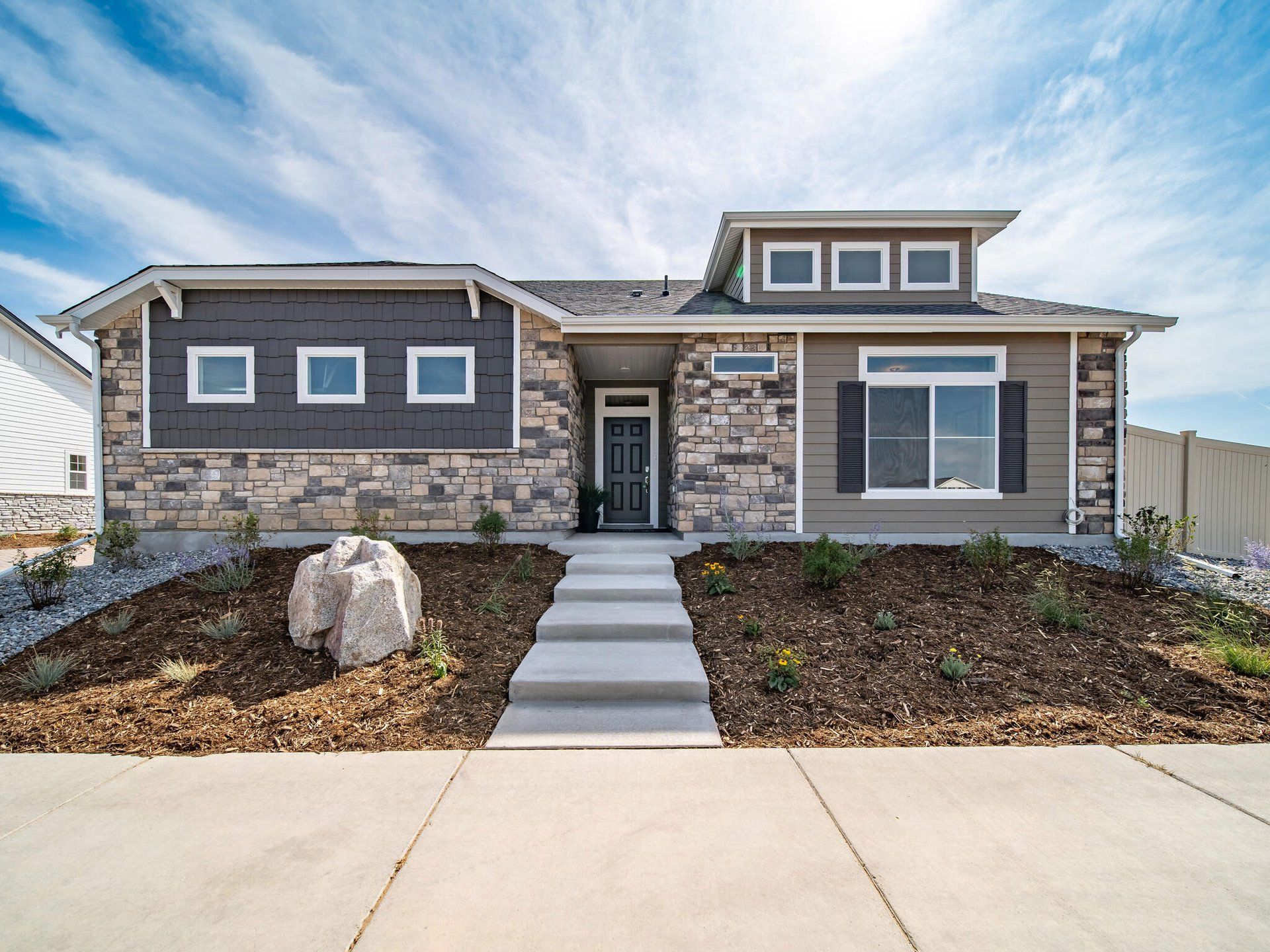 Representative exterior photo of a completed home built from the Voyager by Oakwood Homes Co in The Reserve at Green Valley Ranch Aurora, Aurora, CO (Image 1). Representative exterior photo of a completed home built from the Voyager by Oakwood Homes Co in The Reserve at Green Valley Ranch Aurora, Aurora, CO (Image 1).