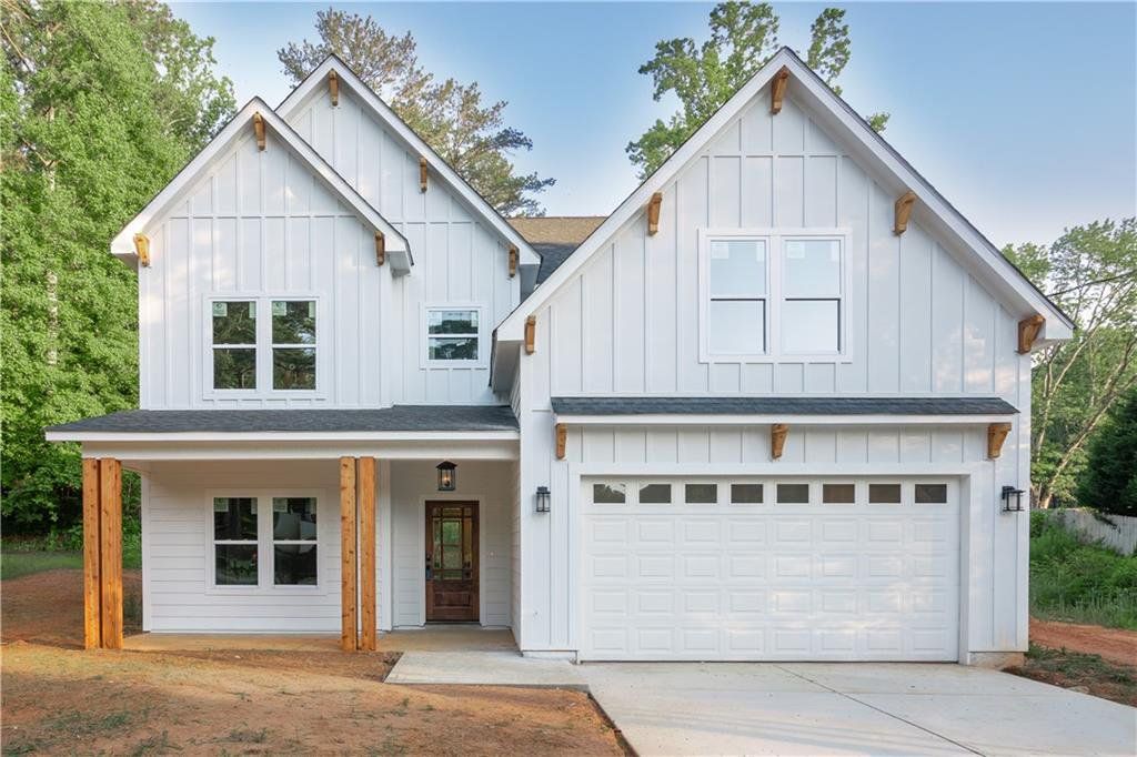 Front exterior of a new home in , Austell, GA, highlighting curb appeal (Image 1). Front exterior of a new home in , Austell, GA, highlighting curb appeal (Image 1).
