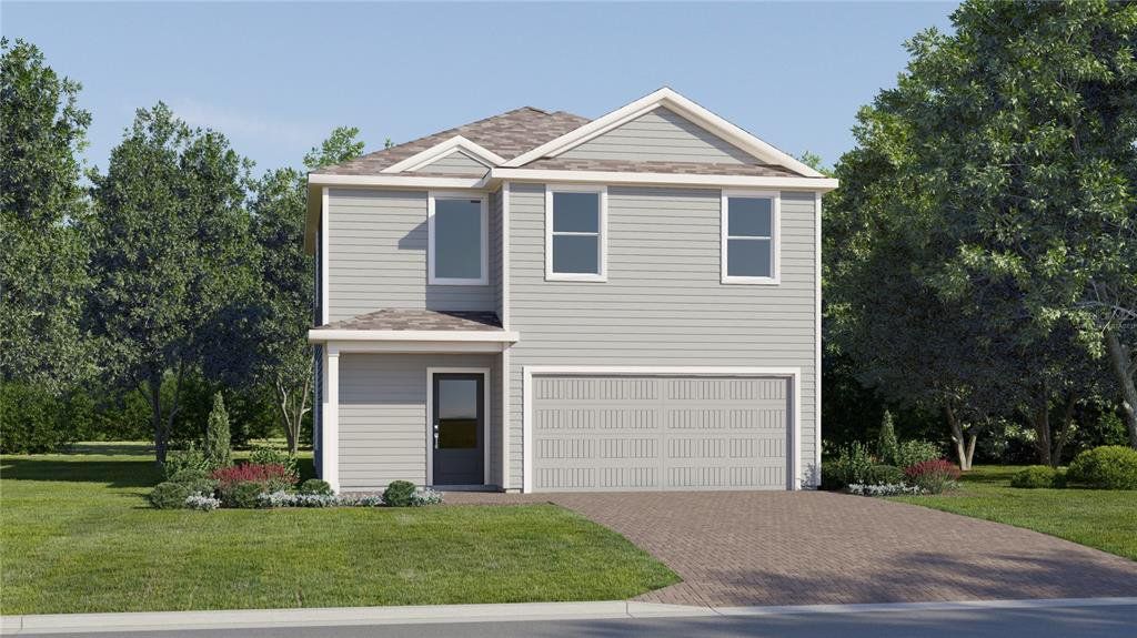 Front exterior of a new home in Wellness Ridge, Clermont, FL, highlighting curb appeal (Image 1). Front exterior of a new home in Wellness Ridge, Clermont, FL, highlighting curb appeal (Image 1).
