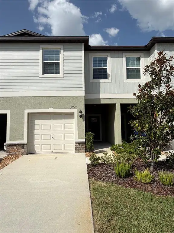 Front exterior of a new home in , San Antonio, FL, highlighting curb appeal (Image 1). Front exterior of a new home in , San Antonio, FL, highlighting curb appeal (Image 1).