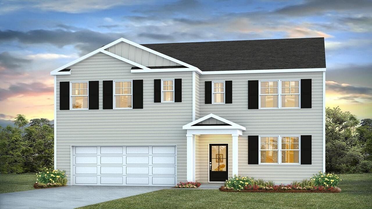 Front exterior of a new home in Carolina Groves, Moncks Corner, SC, highlighting curb appeal (Image 1). Front exterior of a new home in Carolina Groves, Moncks Corner, SC, highlighting curb appeal (Image 1).