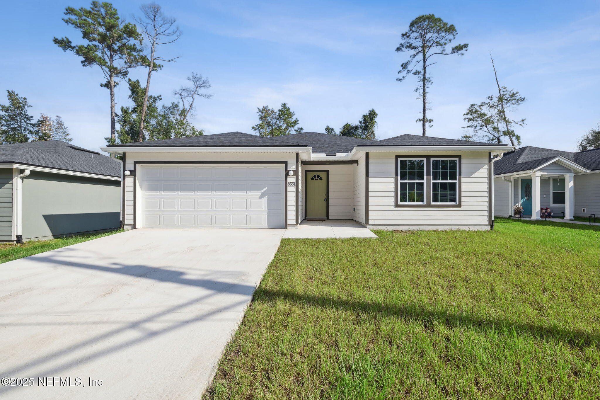Front exterior of a new home in , Jacksonville, FL, highlighting curb appeal (Image 1). Front exterior of a new home in , Jacksonville, FL, highlighting curb appeal (Image 1).