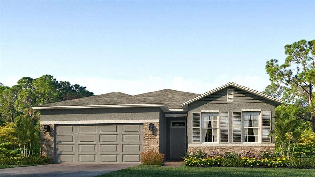 Front exterior of a new home in Ocala Preserve, Ocala, FL, highlighting curb appeal (Image 1). Front exterior of a new home in Ocala Preserve, Ocala, FL, highlighting curb appeal (Image 1).