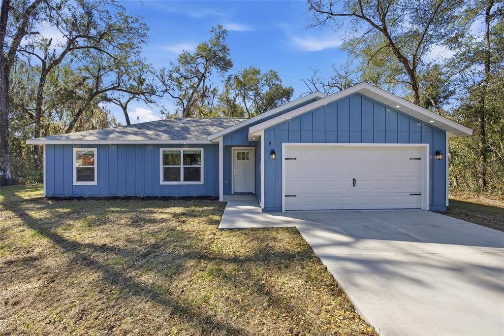 Front exterior of a new home in , Ocala, FL, highlighting curb appeal (Image 1). Front exterior of a new home in , Ocala, FL, highlighting curb appeal (Image 1).