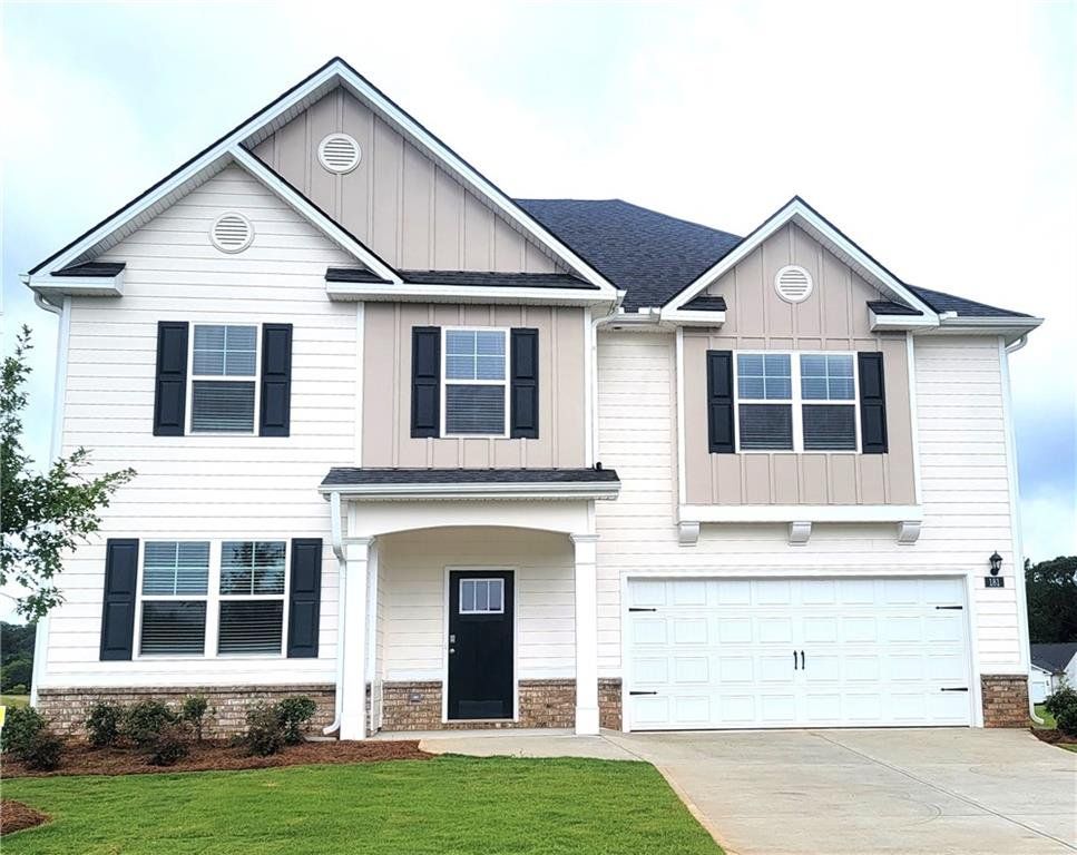 Front exterior of a new home in Jackson Landing, Jefferson, GA, highlighting curb appeal (Image 1). Front exterior of a new home in Jackson Landing, Jefferson, GA, highlighting curb appeal (Image 1).
